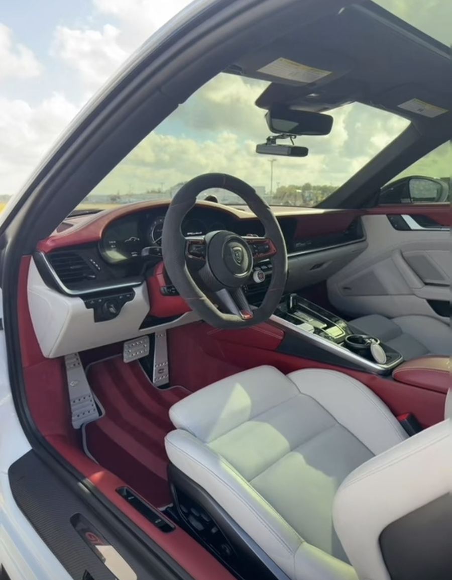 Porsche 911 cabin in red and white leather after a full mobile interior detail in Austin
